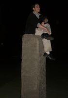 Sitting on the Statue